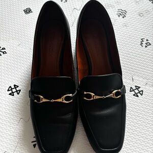 SOLD! Coach Black heeled Loafers with Gold Accents